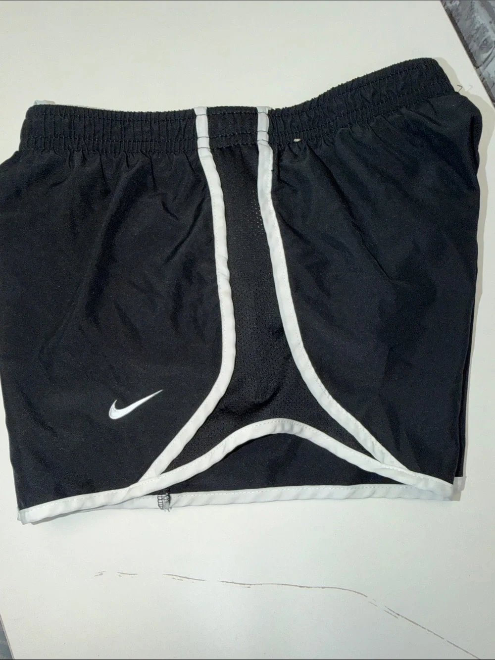 Girls Nike Black Shorts with White Trim and Swoosh
